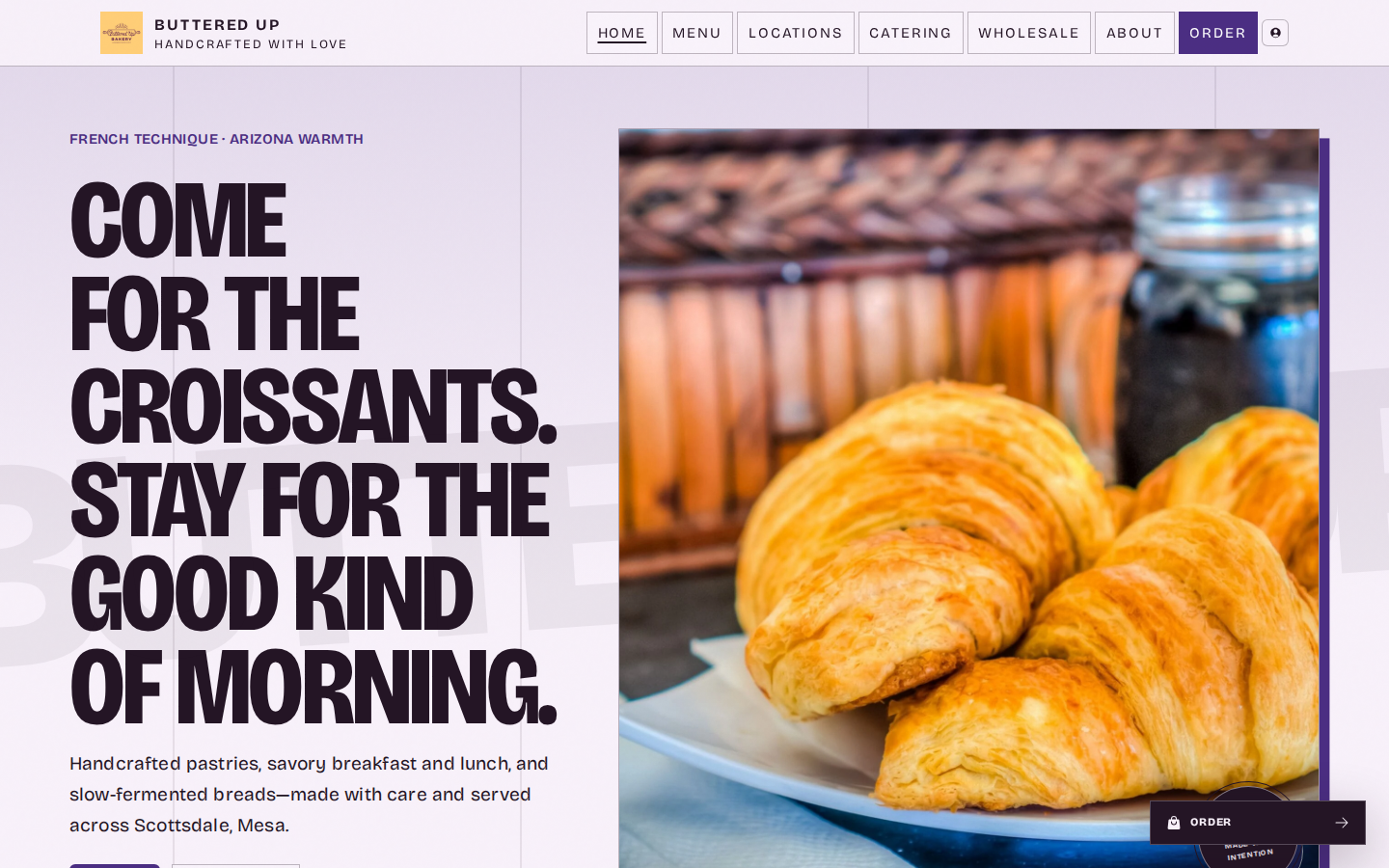 Published Buttered Up tenant website home page with branded navigation, hero copy, product photography, and gift card promotion